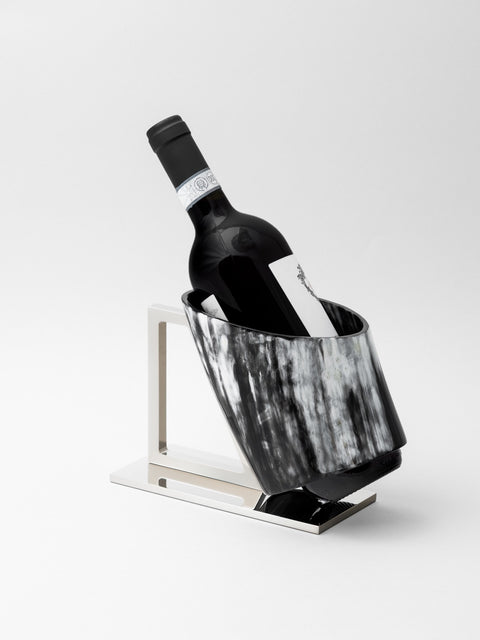 Wine glasses and a bottle on a table - luxury wine accessories at